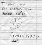 Scanned image of a note handed to Lori Moriarty by children.  It says  Thank you for making my home safe from: Kassy & Zach